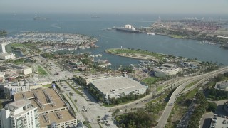 4.8K aerial stock footage approach Rainbow Harbor, aquarium, and the Queen Mary in Long Beach, California Aerial Stock Footage | AX68_052