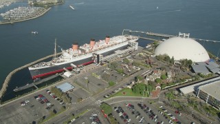 4.8K aerial stock footage orbit the bow of the Queen Mary luxury liner in Long Beach, California Aerial Stock Footage | AX68_069