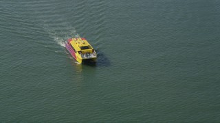 4.8K aerial stock footage of ferry slowly sailing across San Pedro Bay, Long Beach, California Aerial Stock Footage | AX68_074