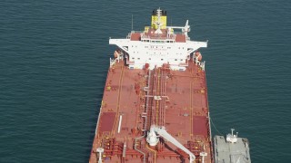 4.8K aerial stock footage fly over the deck of an oil tanker anchored in San Pedro Bay, Long Beach, California Aerial Stock Footage | AX68_081