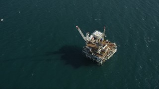 4.8K aerial stock footage of bird's eye of an oil drilling platform near the California Coast, Long Beach Aerial Stock Footage | AX68_103