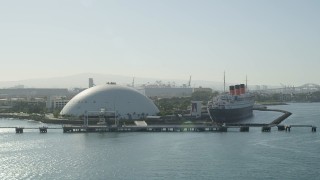 4.8K aerial stock footage approach the Long Beach Cruise Terminal and Queen Mary in Long Beach, California Aerial Stock Footage | AX68_133