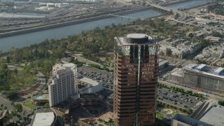 4.8K aerial stock footage approach and fly over a modern office building in Downtown Long Beach, California Aerial Stock Footage | AX68_138