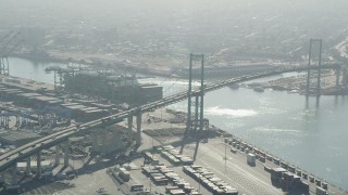 4.8K aerial stock footage of light traffic crossing the Vincent Thomas Bridge in Port of Los Angeles, California Aerial Stock Footage | AX68_147