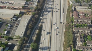 4.8K aerial stock footage of bird's eye view of light traffic on I-110 in Carson, California Aerial Stock Footage | AX68_177