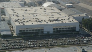 AX68_191 - 4.8K aerial stock footage of SpaceX office building in Hawthorne, California