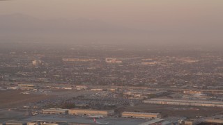 4.8K aerial stock footage track an airliner on approach to LAX at sunset, Los Angeles, California Aerial Stock Footage | AX69_010