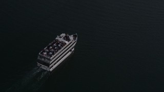 4.8K aerial stock footage of tracking a ferry on the water in Marina Del Rey at sunset, California Aerial Stock Footage | AX69_022