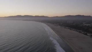 4.8K aerial stock footage approach Santa Monica State Beach, deserted at twilight, California Aerial Stock Footage | AX69_037