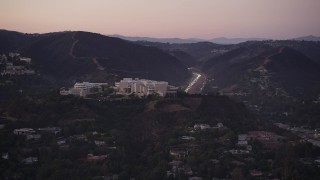 4.8K aerial stock footage of J. Paul Getty Museum in the hills above Brentwood at twilight, California Aerial Stock Footage | AX69_052