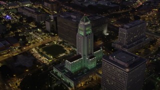 4.8K aerial stock footage orbit Los Angeles City Hall in Downtown Los Angeles, California at night Aerial Stock Footage | AX69_084