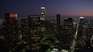 4.8K aerial stock footage of Downtown Los Angeles skyscrapers at nighttime, California Aerial Stock Footage | AX69_102