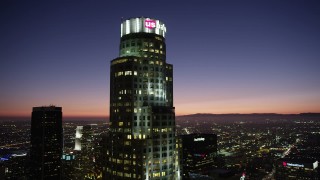 4.8K aerial stock footage of an orbit of US Bank Tower in Downtown Los Angeles at nighttime, California Aerial Stock Footage | AX69_113