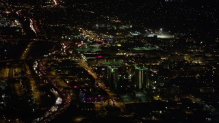 4.8K aerial stock footage approach Holiday Inn and Burbank Town Center in Burbank, California at night Aerial Stock Footage | AX69_142