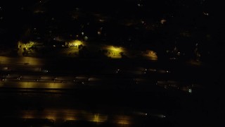 4.8K aerial stock footage bird's eye view of light nighttime traffic traveling on Interstate 5 in Burbank, California Aerial Stock Footage | AX69_149