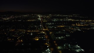 4.8K aerial stock footage of warehouse buildings on San Fernando Road at night in Pacoima, California Aerial Stock Footage | AX69_151