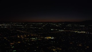 4.8K aerial stock footage of suburban neighborhoods around I-5 at night in Arleta, California Aerial Stock Footage | AX69_155