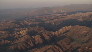 4K aerial stock footage Mountains at sunrise in Los Padres National Forest, California Aerial Stock Footage | AX70_010