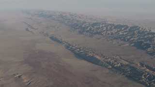 AX70_039 - 4K aerial stock footage San Andreas Fault in a desert plain beside the Temblor Range in Southern California