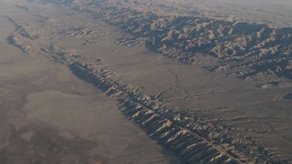 AX70_042 - 4K aerial stock footage Approach and tilt to the San Andreas Fault beside the Temblor Range in Southern California