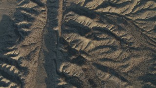 AX70_049 - 4K aerial stock footage Bird's eye view of San Andreas Fault, Southern California, at sunrise