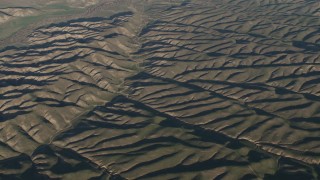 4K aerial stock footage Flying over desert hills in San Luis Obispo County, California Aerial Stock Footage | AX70_072