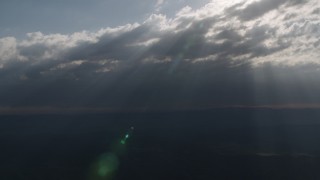 4K aerial stock footage of Godrays from the clouds over San Luis Obispo County, California Aerial Stock Footage | AX70_077