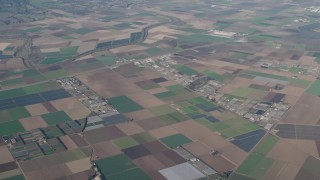 AX70_083 - 4K aerial stock footage Farms, greenhouses, and crop fields in Salinas, California