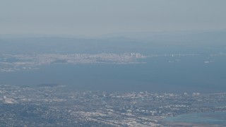 4K aerial stock footage San Francisco, the Bay Bridge, and San Francisco Bay seen from San Mateo, California Aerial Stock Footage | AX70_093