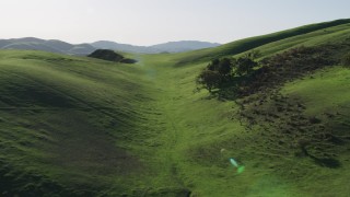 AX70_124 - 4K aerial stock footage Green hills in Hollister, California