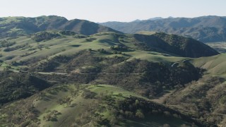 4K aerial stock footage Approach hills with trees in Paicines, California Aerial Stock Footage | AX70_152