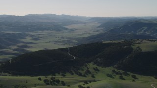 4K aerial stock footage of A valley and green hills in San Benito County, California Aerial Stock Footage | AX70_170