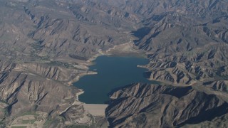 4K aerial stock footage Flying by the Santa Felicia Dam and Lake Piru in the Los Padres National Forest, California Aerial Stock Footage | AX70_188