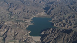 AX70_189 - 4K aerial stock footage Santa Felicia Dam by Lake Piru in the Los Padres National Forest, California