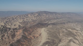 4K aerial stock footage Flyby a rugged desert mountains in the Caliente Mountain Range, California Aerial Stock Footage | AX70_203