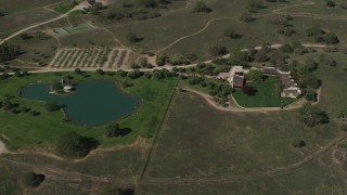 4K aerial stock footage Upscale home and a pond in Paso Robles, California Aerial Stock Footage | AX70_229