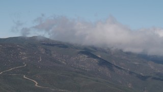 4K aerial stock footage Low clouds over the Santa Lucia Range, California Aerial Stock Footage | AX70_253