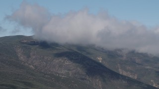 4K aerial stock footage Passing low clouds over the Santa Lucia Range, California Aerial Stock Footage | AX70_255