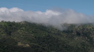 4K aerial stock footage of cloud-capped mountains in the Santa Lucia Range in California Aerial Stock Footage | AX70_274