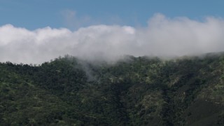 4K aerial stock footage flyby cloud-covered mountains in the Santa Lucia Range in California Aerial Stock Footage | AX70_276