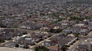 5.1K aerial stock footage of beautiful homes on the coast in Ventnor City, New Jersey Aerial Stock Footage | AX71_206