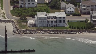 5.1K aerial stock footage flying over a beachfront home in Strathmere, New Jersey Aerial Stock Footage | AX71_235