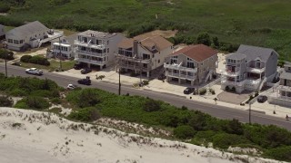 5.1K aerial stock footage flying by beachside homes in Strathmere, New Jersey Aerial Stock Footage | AX71_238E