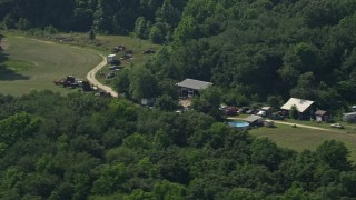 AX72_094 - 5.1K aerial stock footage of junk cars in Henderson, Maryland