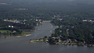 AX72_121 - 5.1K aerial stock footage of riverfront homes by Winchester Creek in Grasonville, Maryland