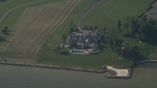 AX73_007 - 5.1K aerial stock footage of a mansion on shore of Chesapeake Bay in Annapolis, Maryland