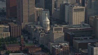 AX73_104 - 5.1K aerial stock footage of Baltimore City Hall in Maryland