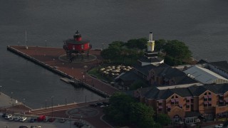 5.1K aerial stock footage of Pier 5 Hotel Complex and the Seven Foot Knoll Lighthouse, Downtown Baltimore, Maryland Aerial Stock Footage | AX73_135