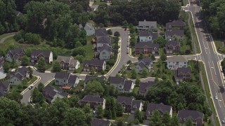 4.8K aerial stock footage of suburban homes by quiet streets in Fairfax, Virginia Aerial Stock Footage | AX74_014