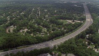 4.8K aerial stock footage flying over freeway, approaching an elementary school in Springfield, Virginia Aerial Stock Footage | AX74_019